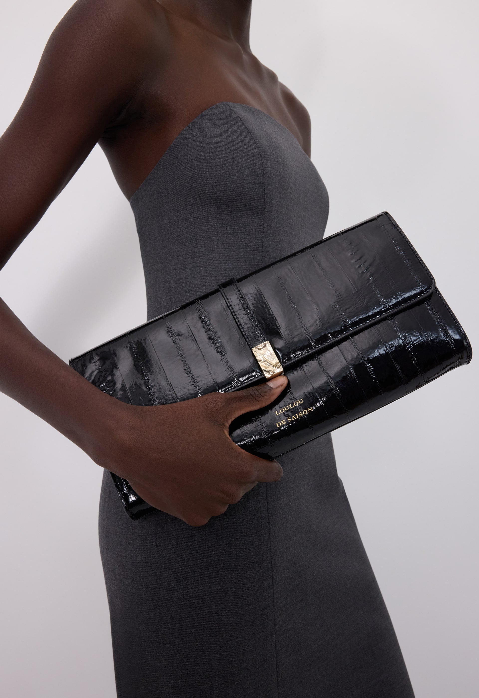 LYDIAN Pochette en cuir effet anguille