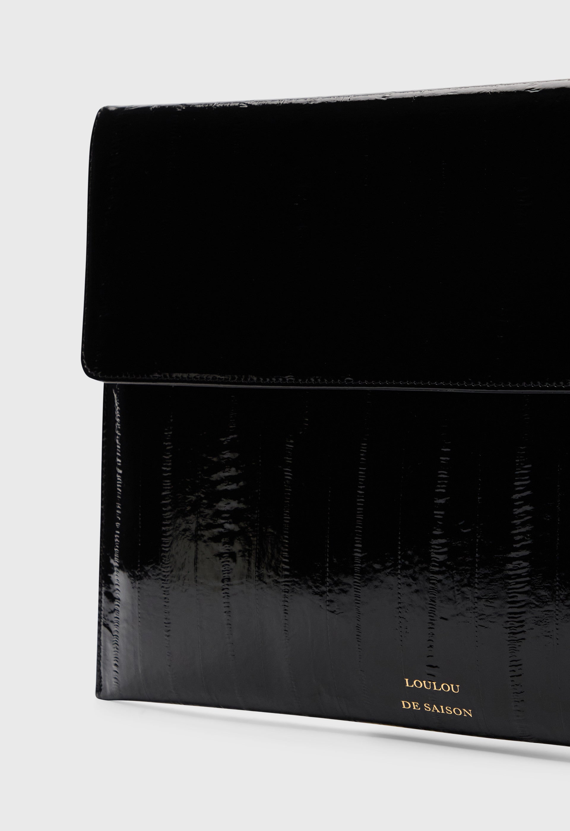 MAURY Eel-effect leather clutch
