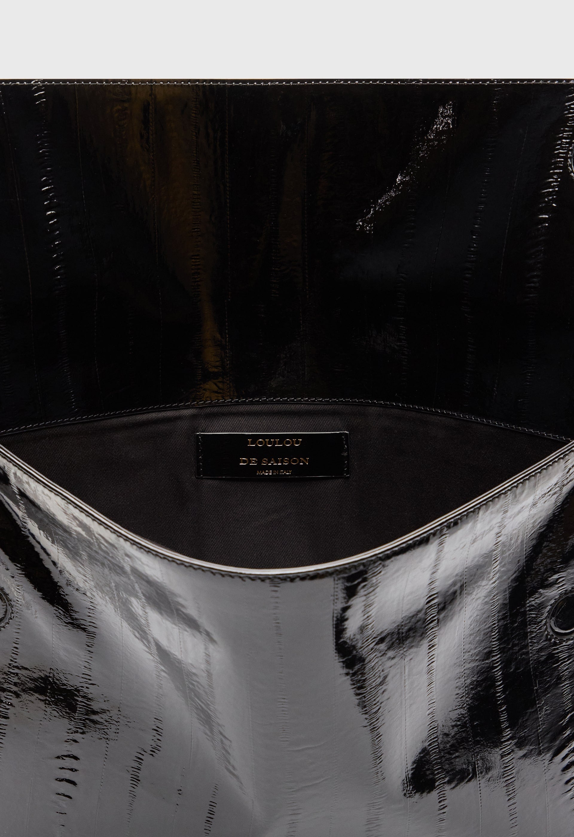 MAURY Eel-effect leather clutch