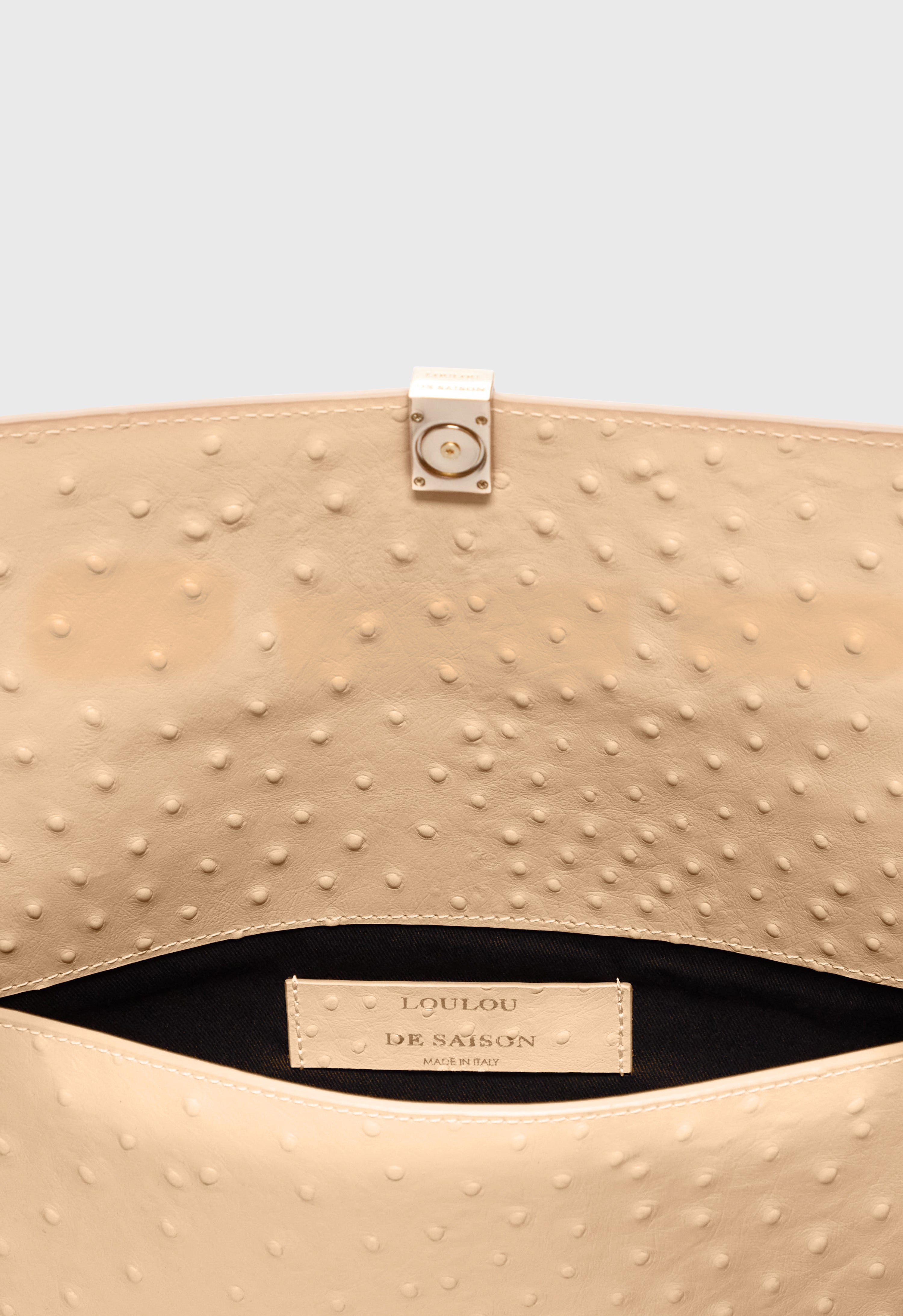 MOHINI Ostrich-effect leather clutch