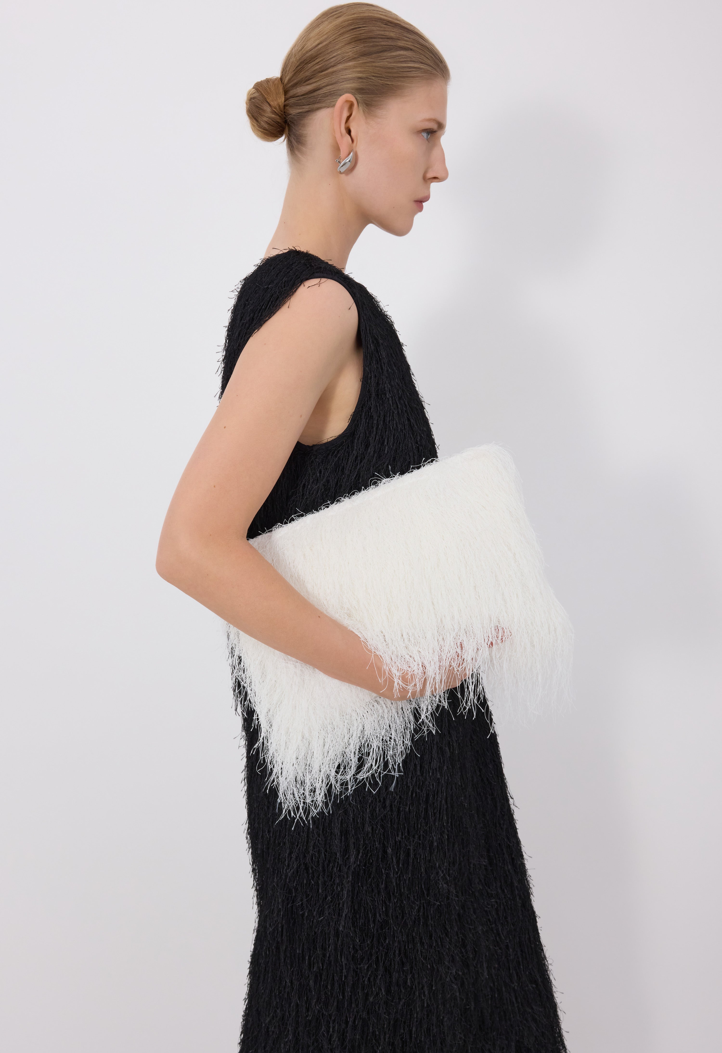 EVANO Fringed clutch