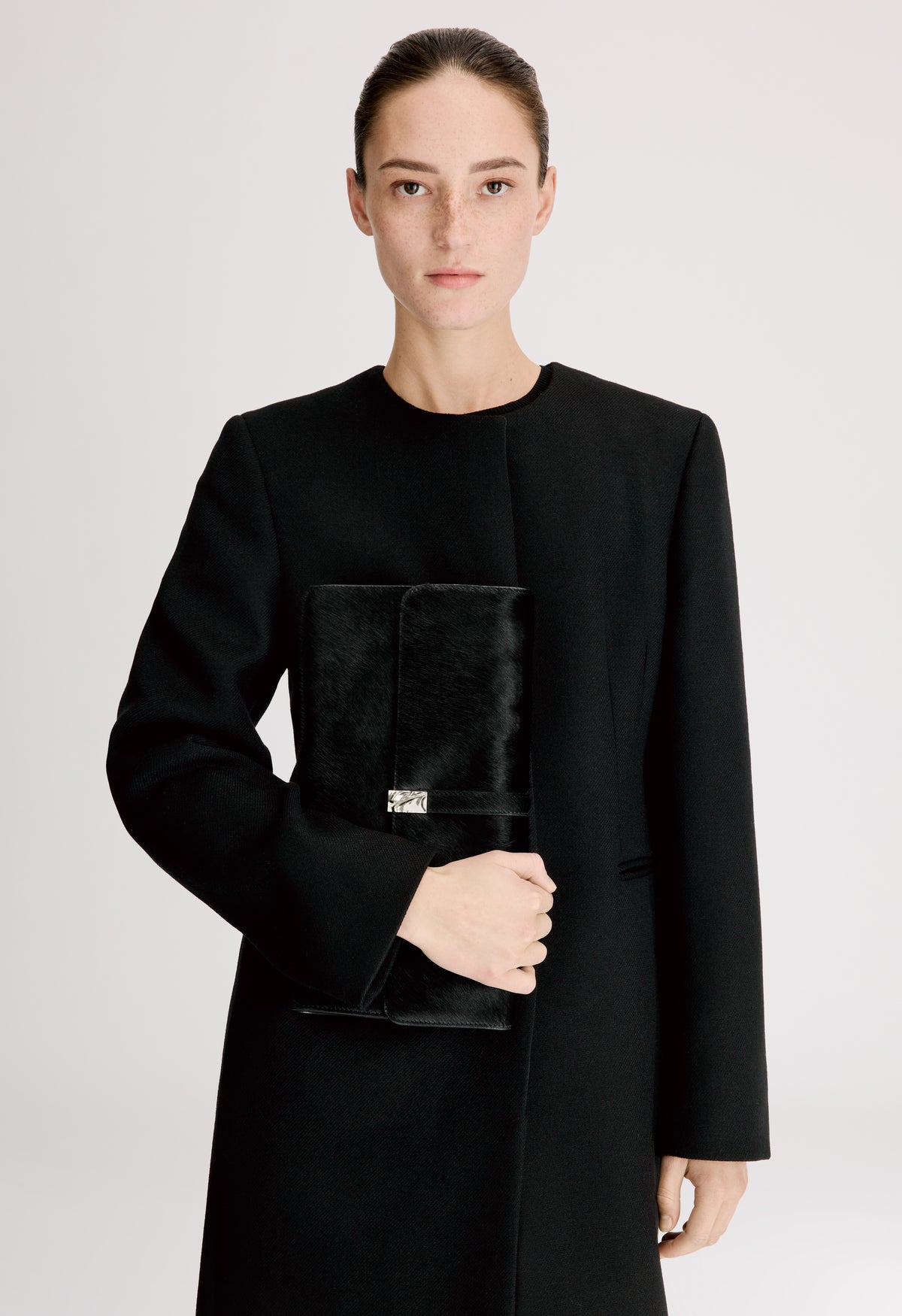 SIMONE Pony-effect leather clutch