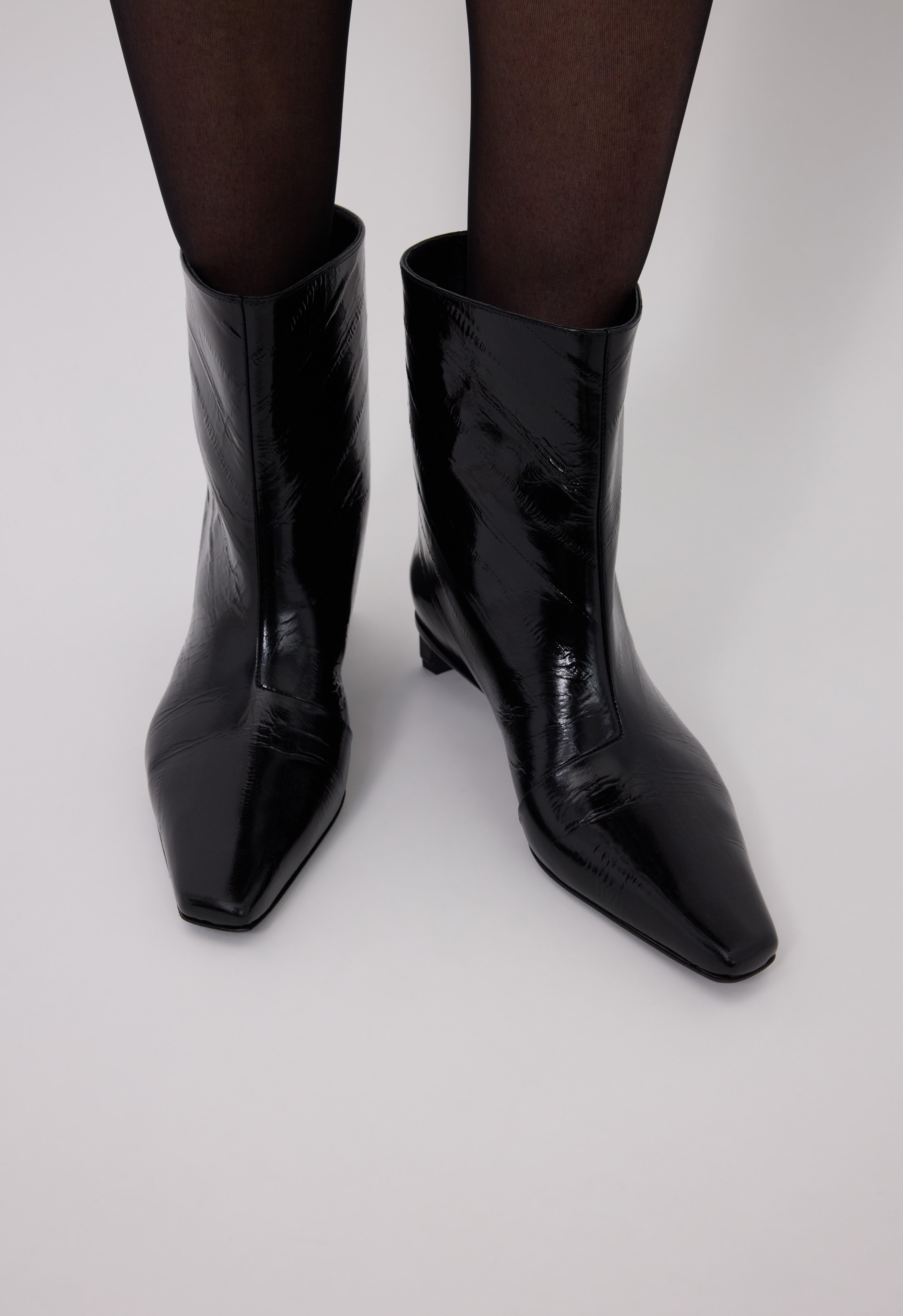 IMAN Eel-effect leather ankle boots