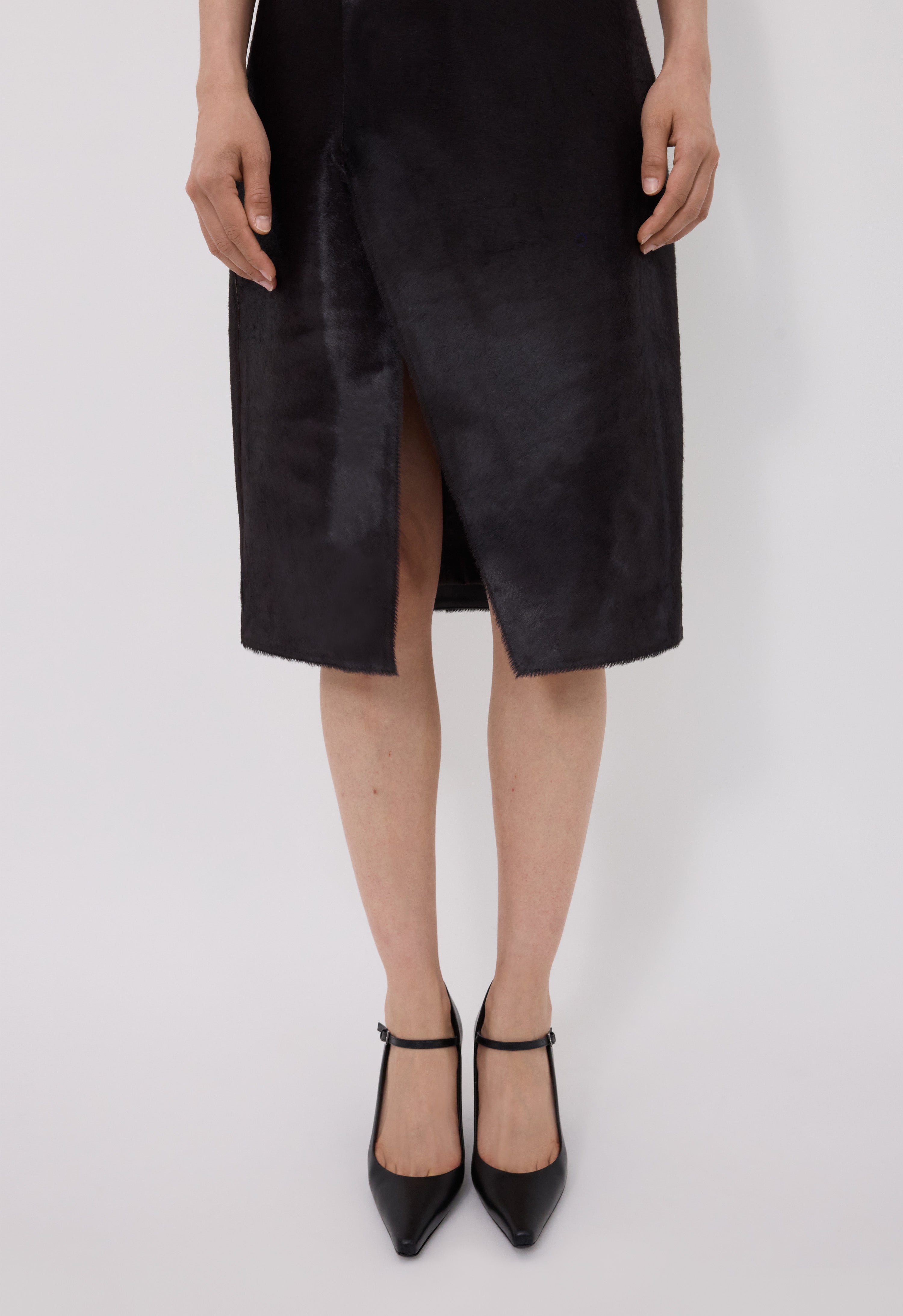 MYRA Asymmetrical pony-effect leather skirt