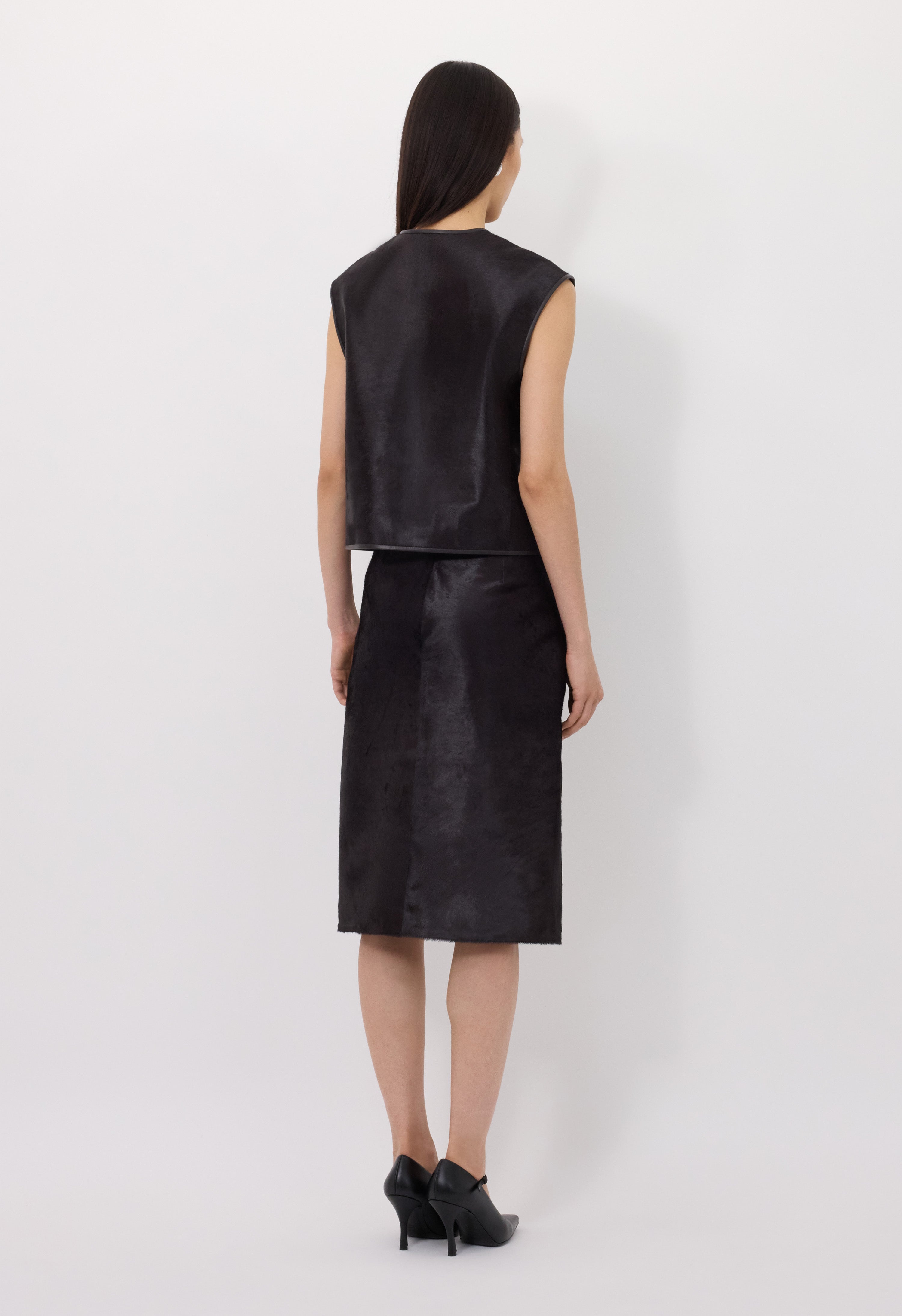 MYRA Asymmetrical pony-effect leather skirt