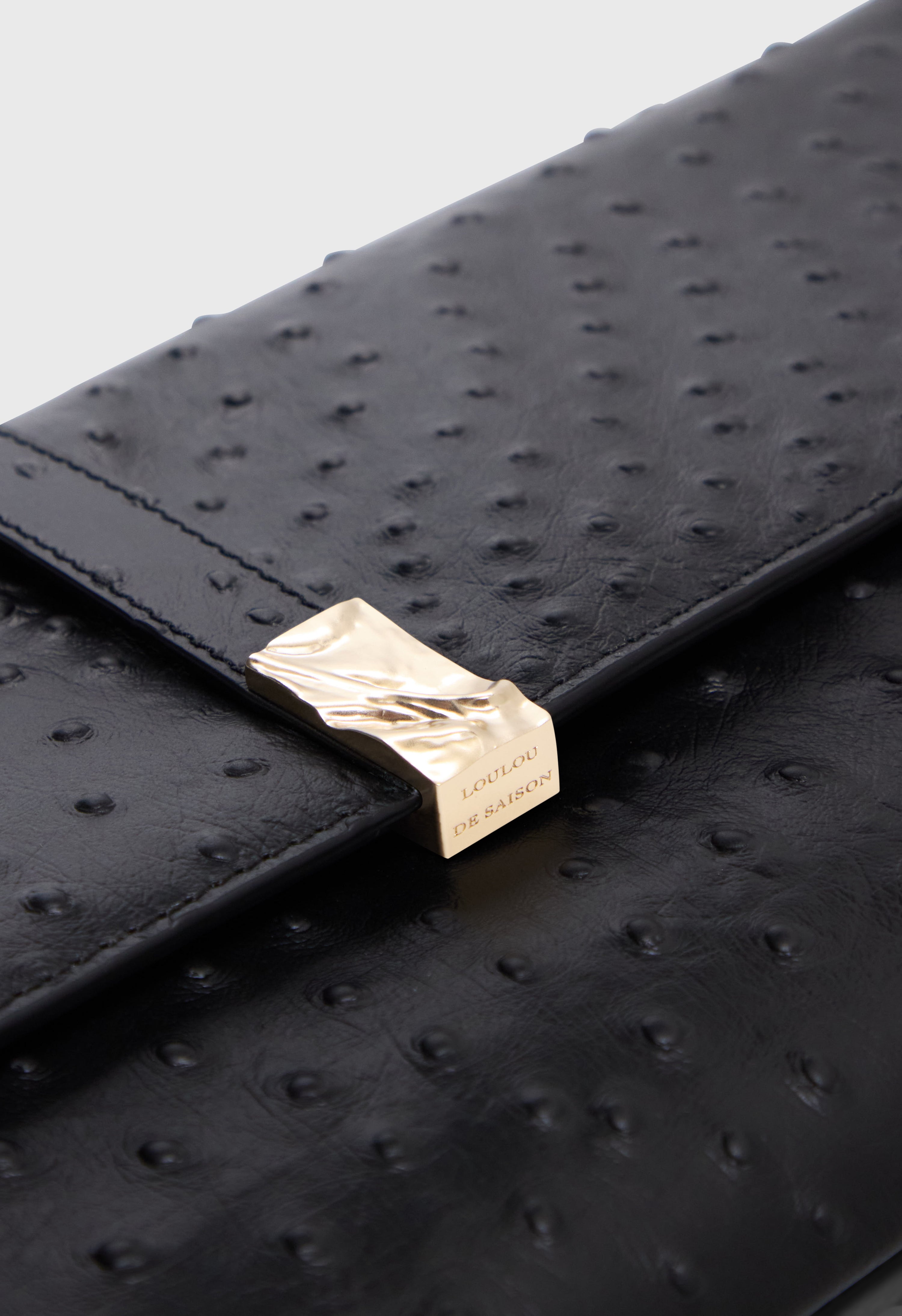 MOHINI Ostrich-effect leather clutch