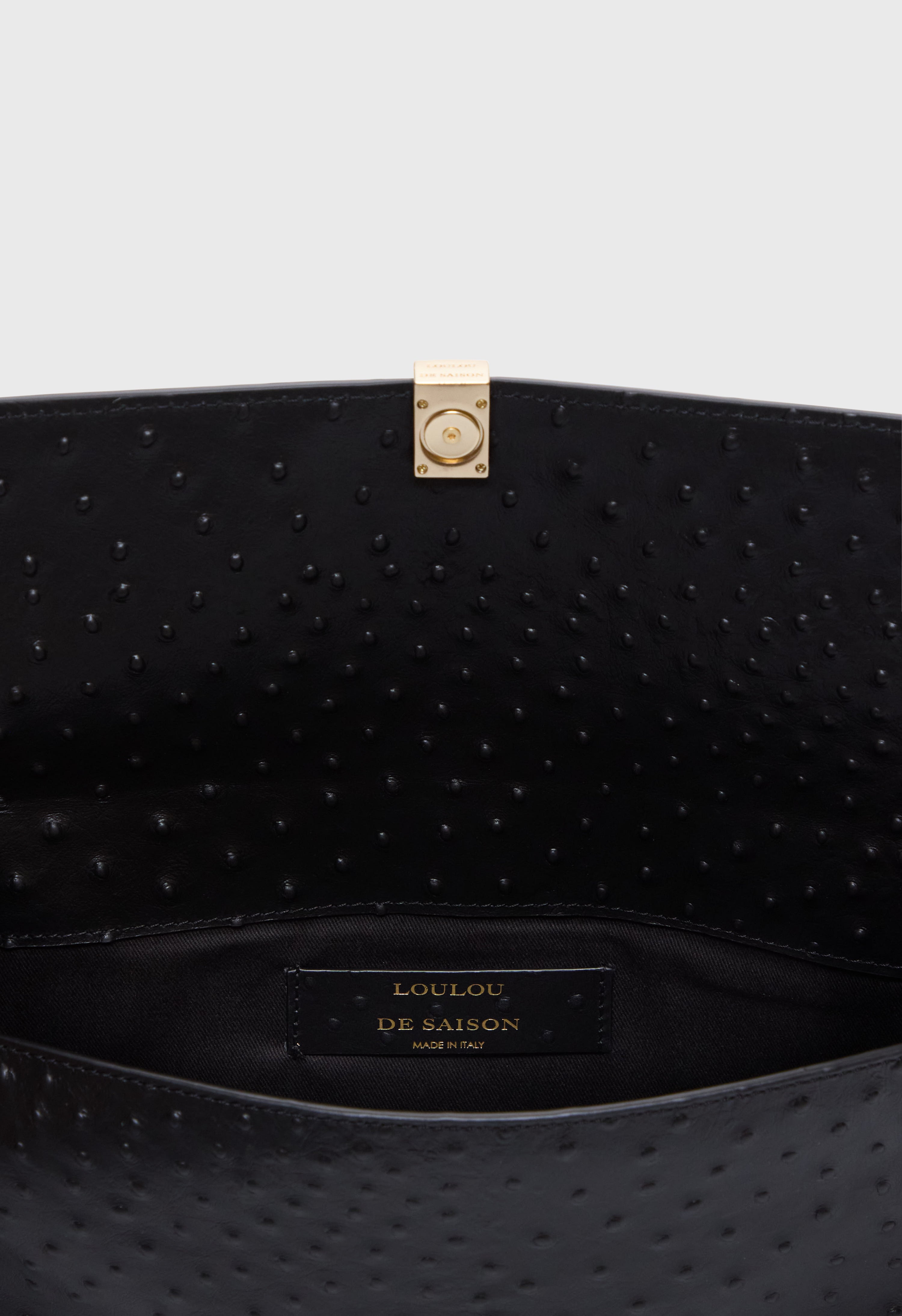 MOHINI Ostrich-effect leather clutch