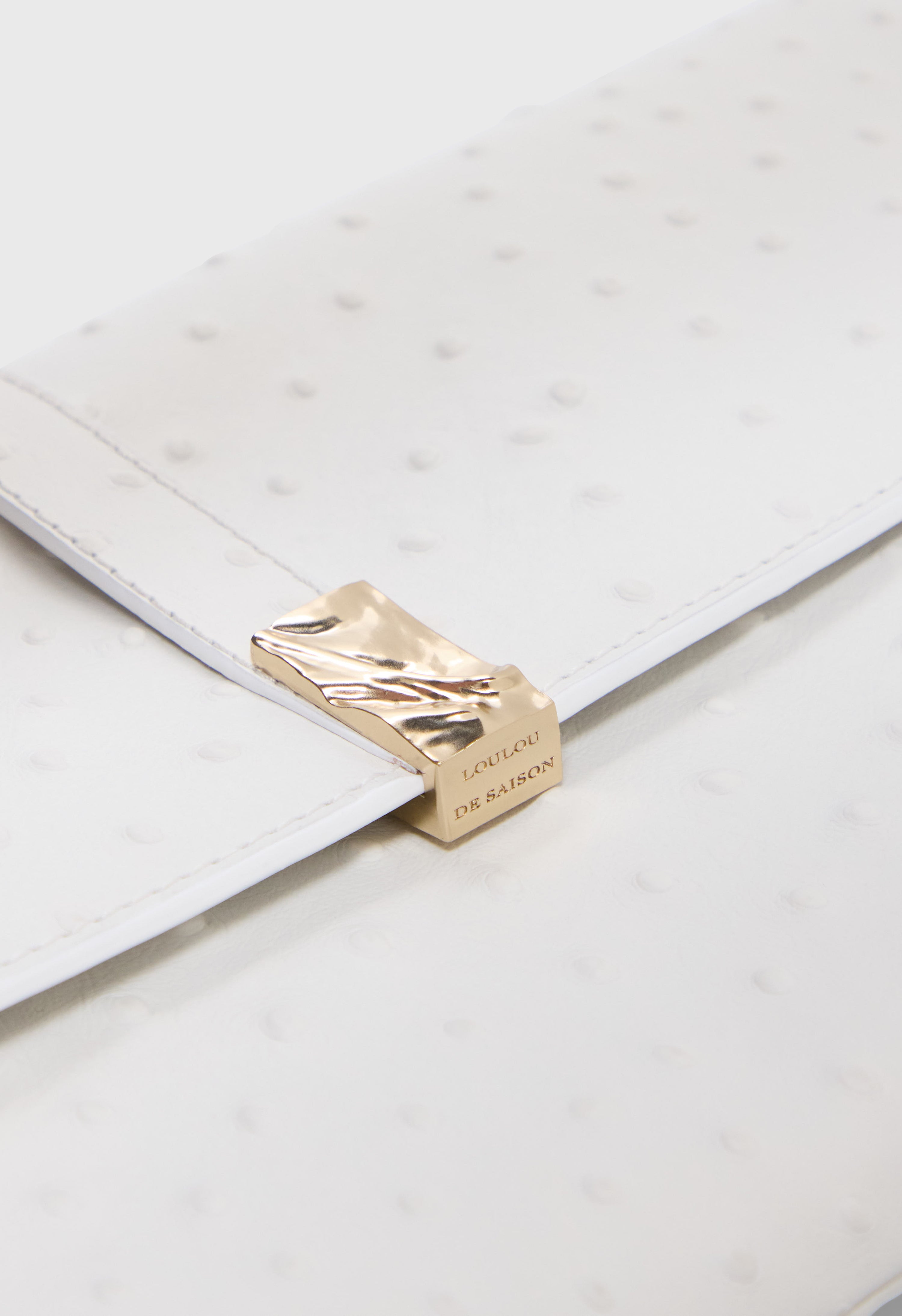 MOHINI Ostrich-effect leather clutch