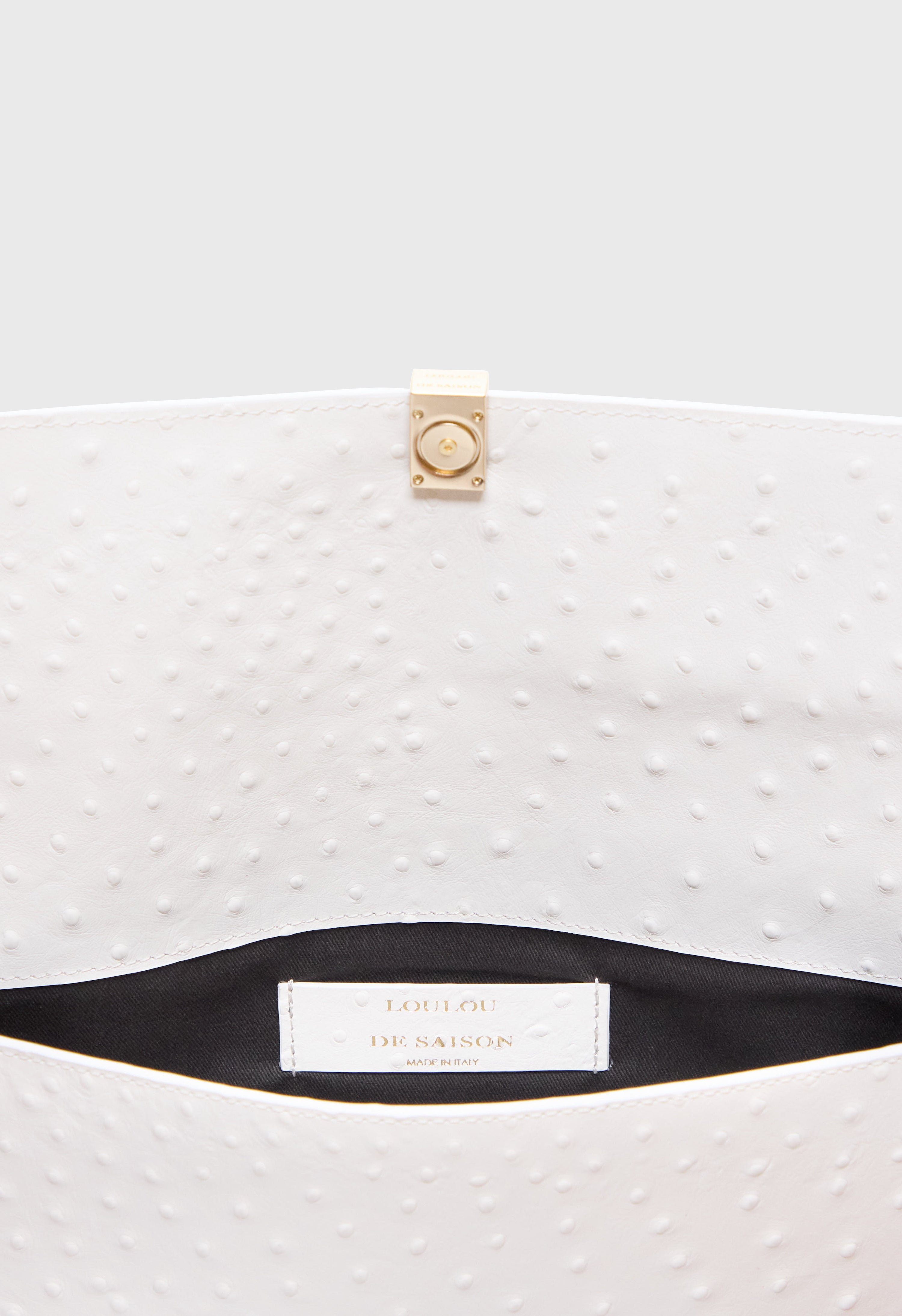 MOHINI Ostrich-effect leather clutch