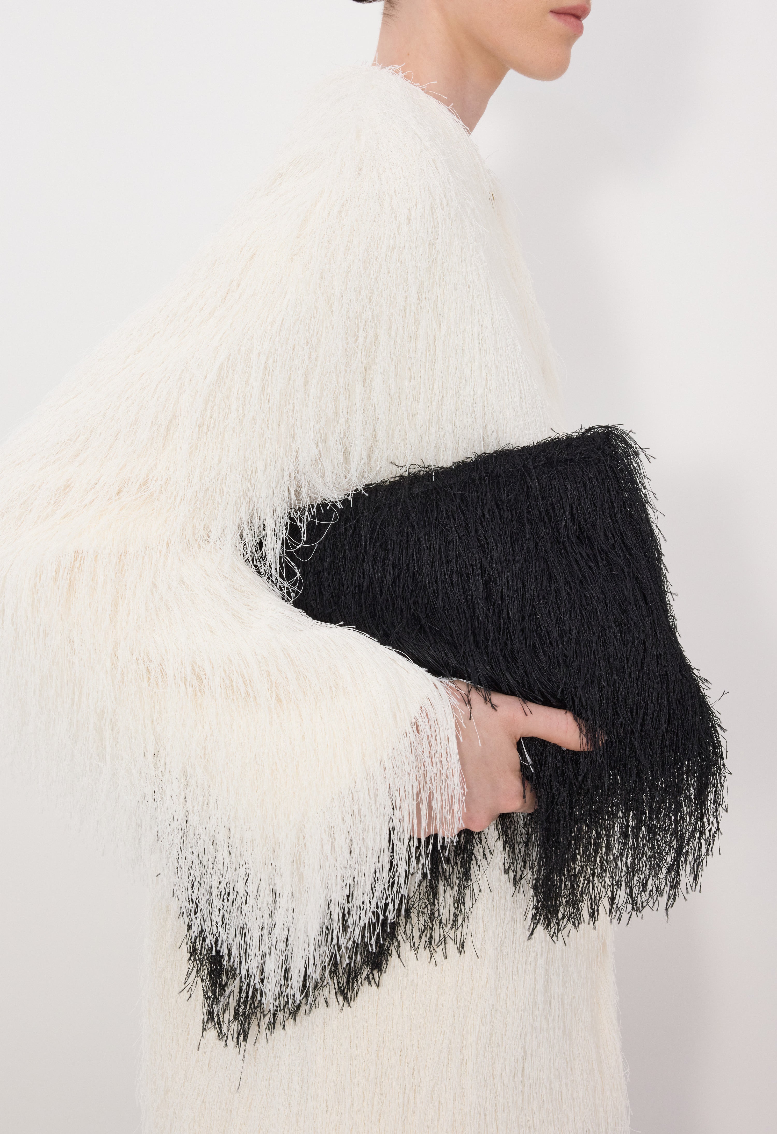 EVANO Fringed clutch