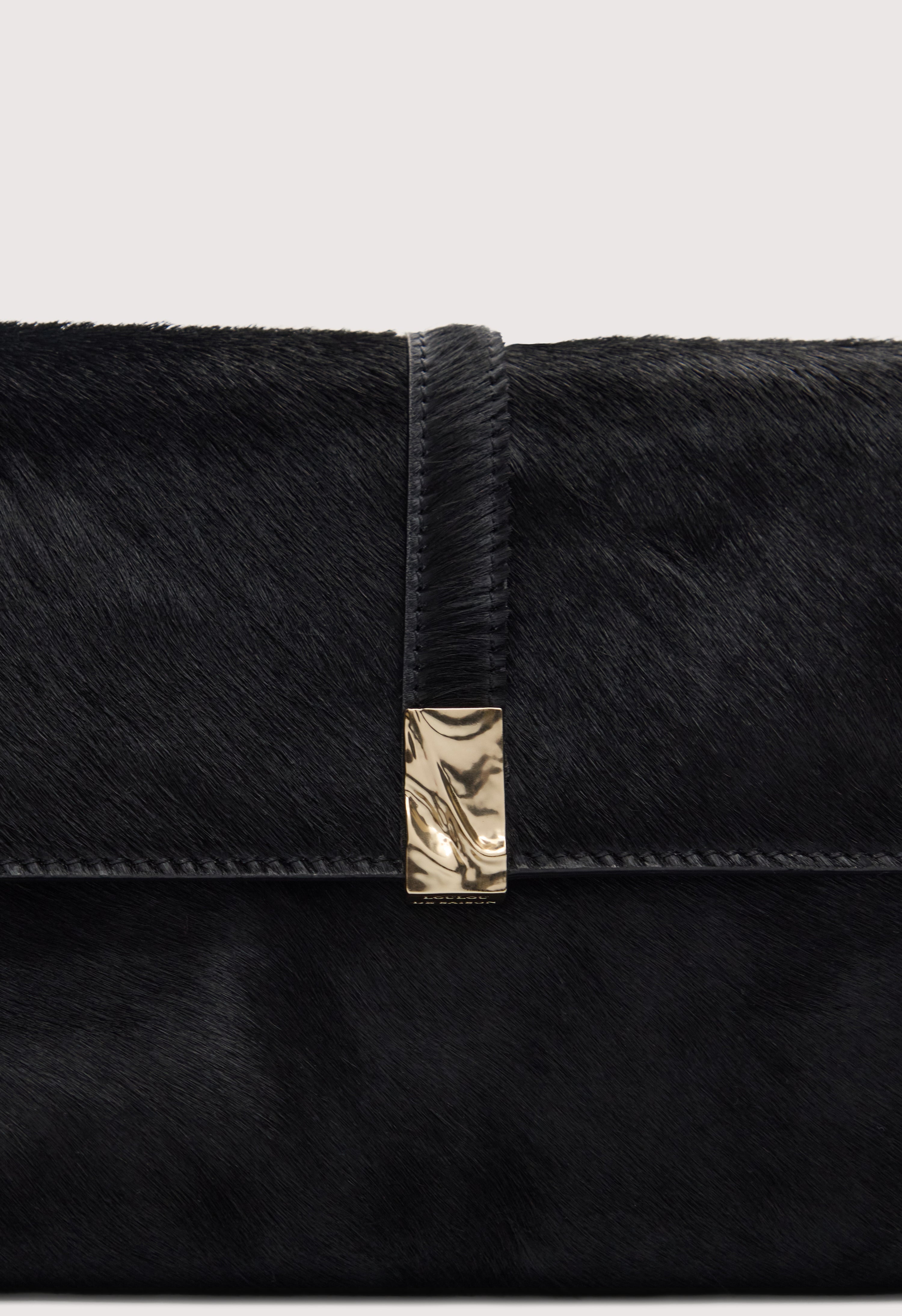 SIMONE Pony-effect leather clutch