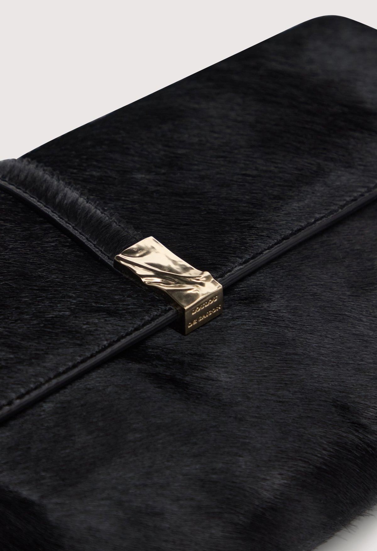 SIMONE Pony-effect leather clutch