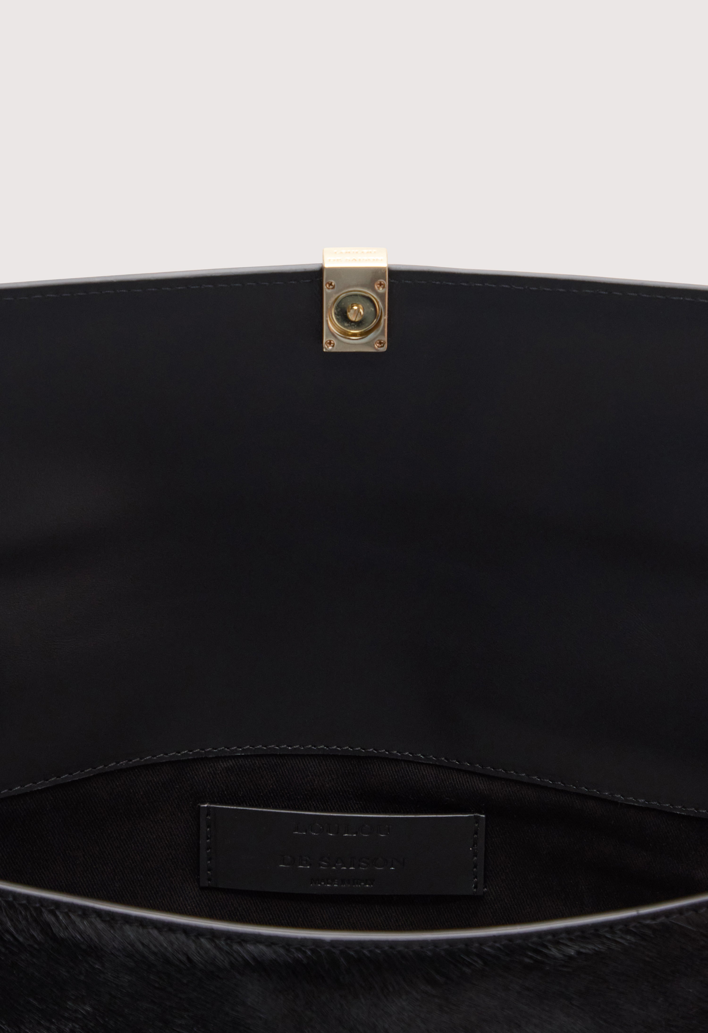 SIMONE Pony-effect leather clutch