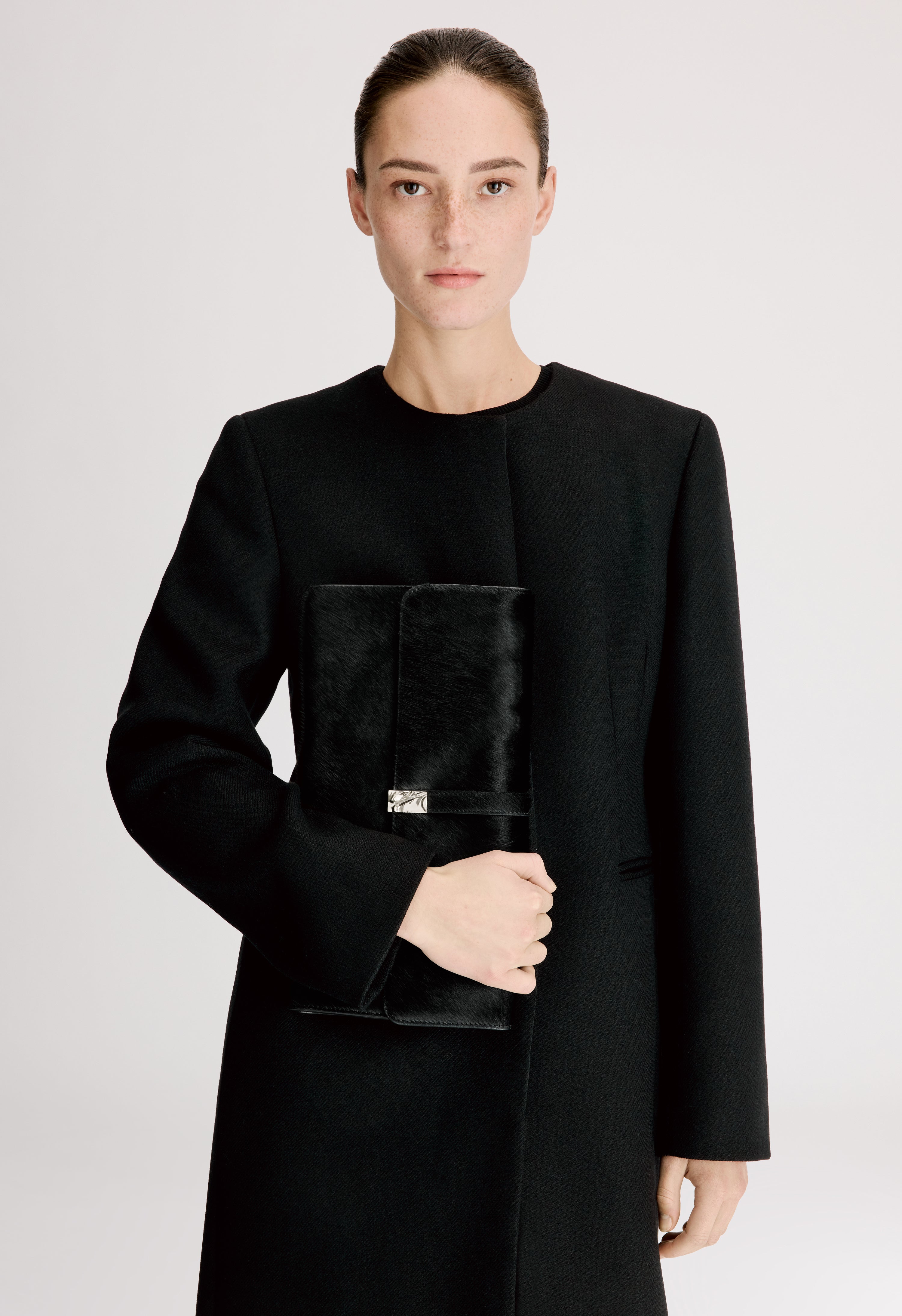 SIMONE Pony-effect leather clutch