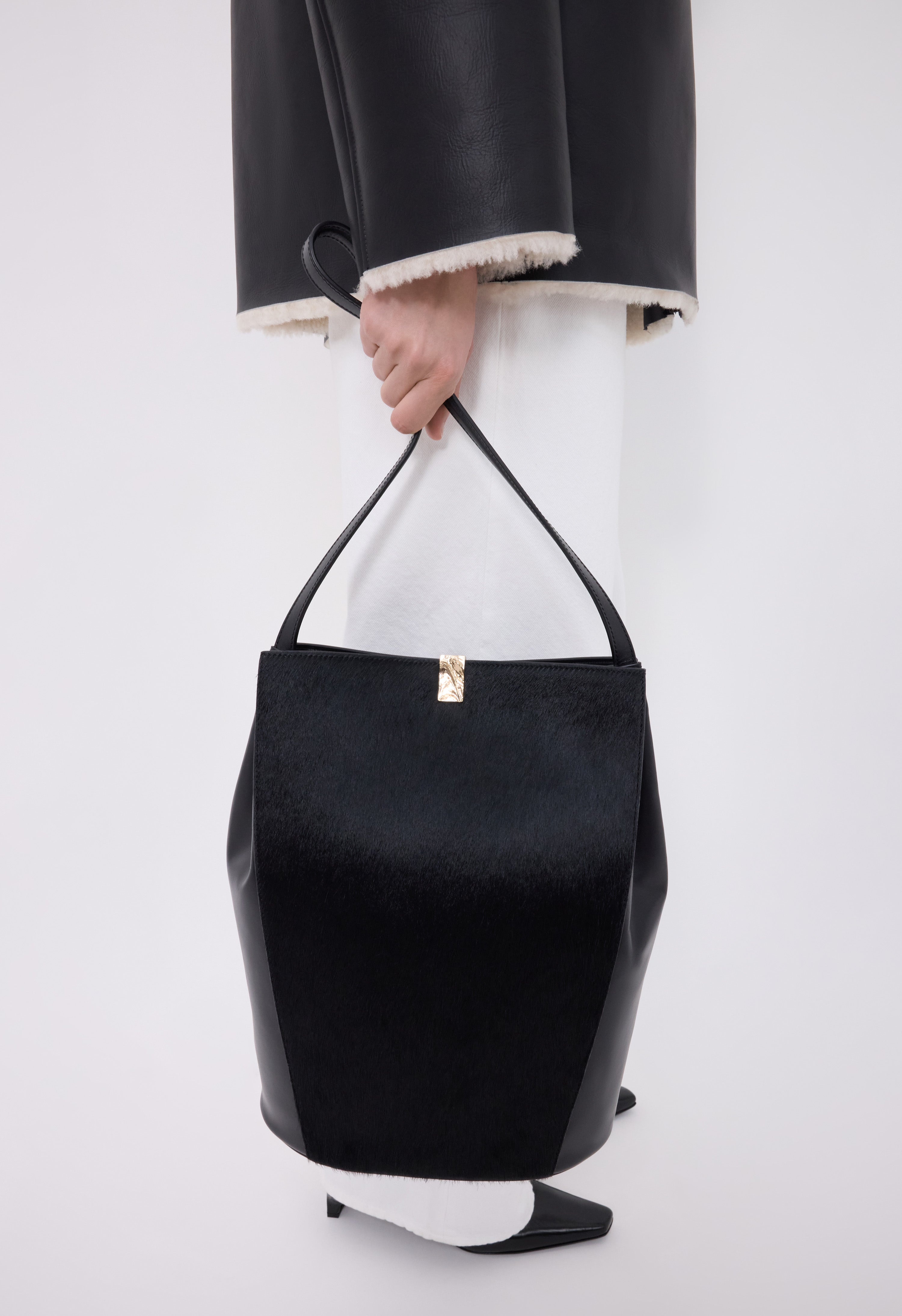 ODILE Pony-effect leather bucket bag