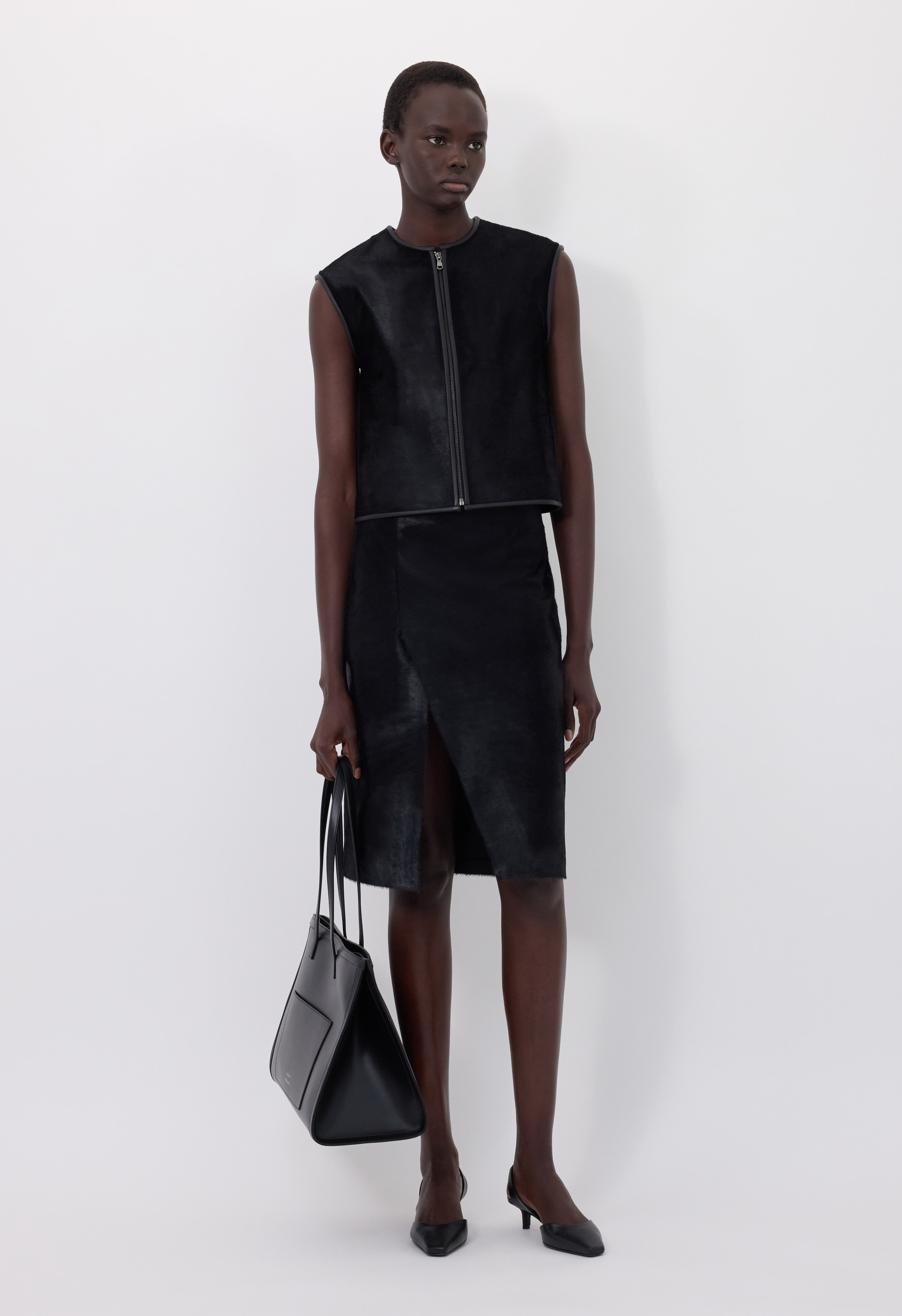 MYRA Asymmetrical pony-effect leather skirt