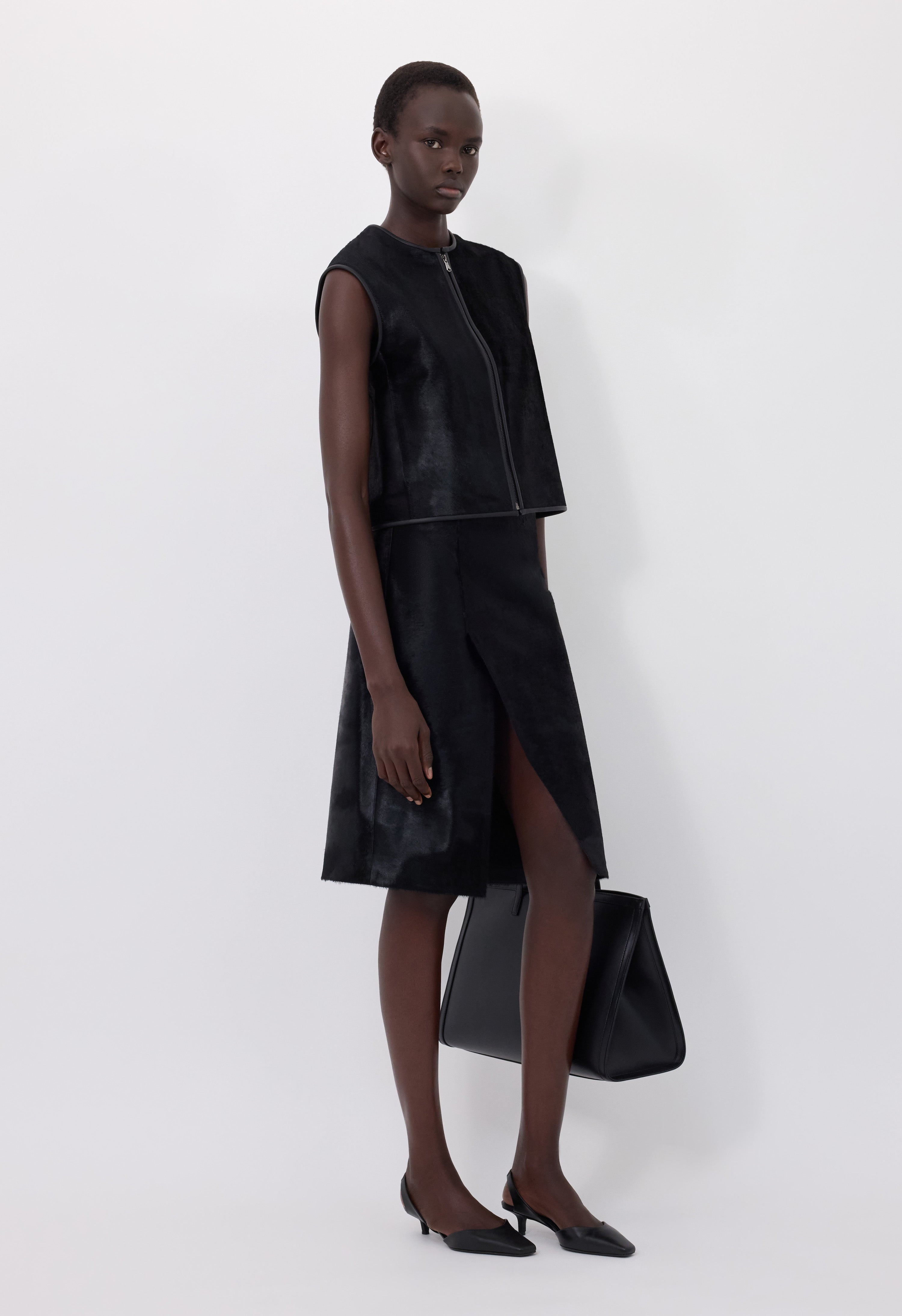 MYRA Asymmetrical pony-effect leather skirt