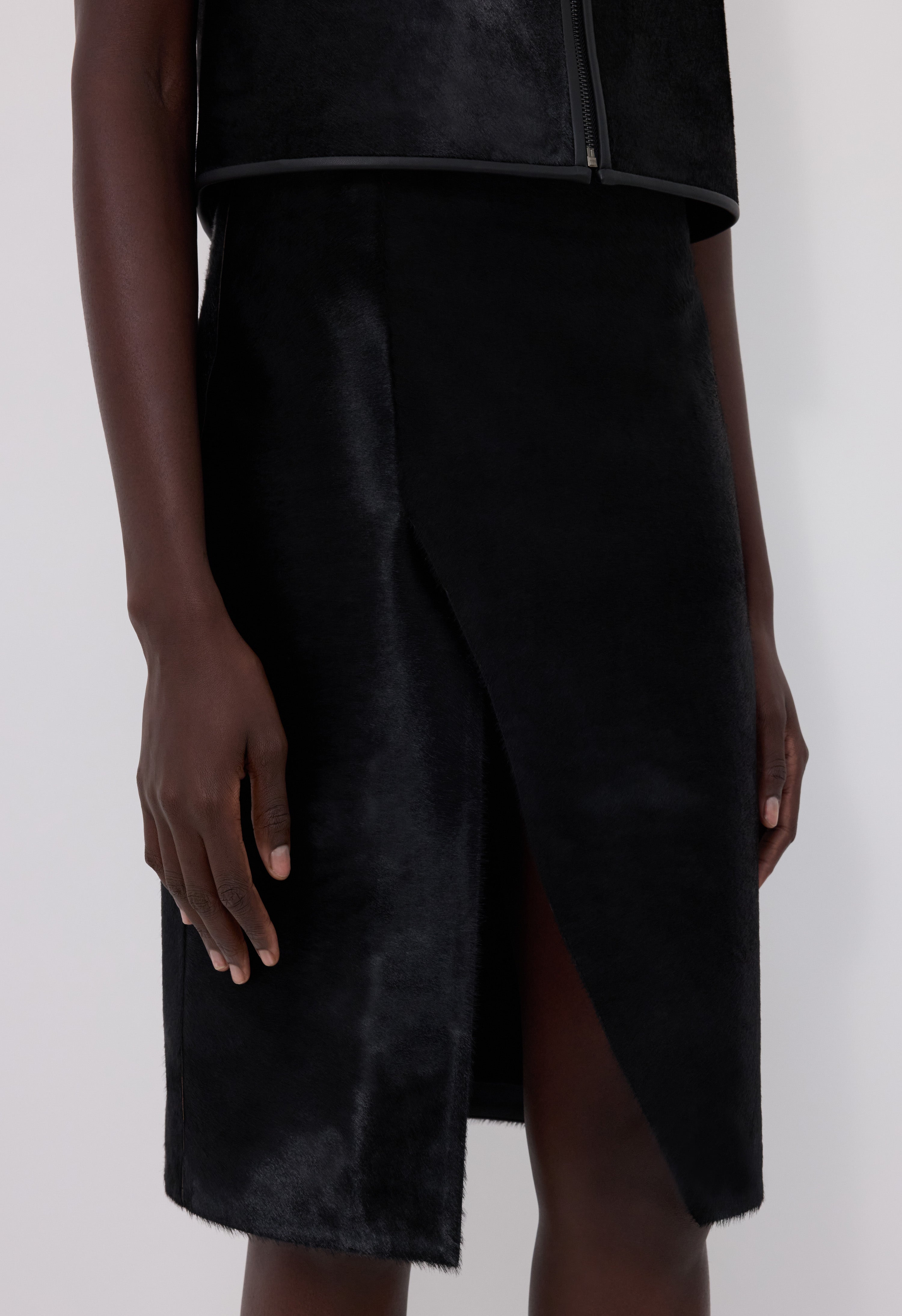 MYRA Asymmetrical pony-effect leather skirt